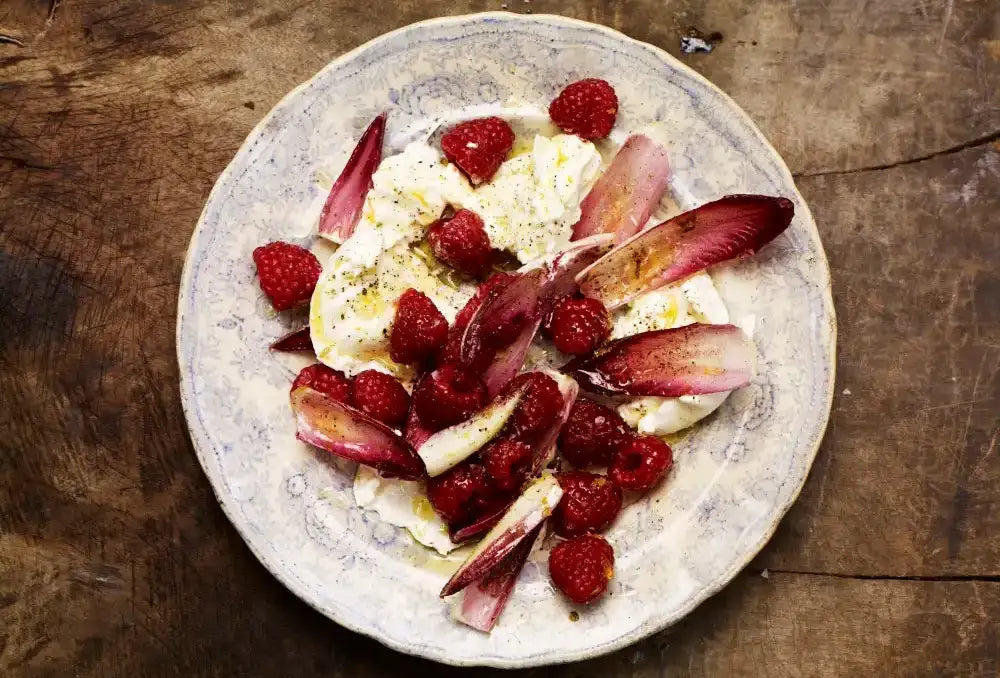 Raspberries with Chicory, olive oil and burrata