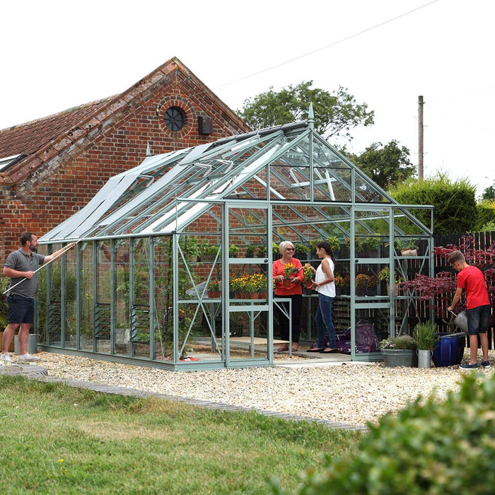 Family using their Rhino Greenhouse to grow