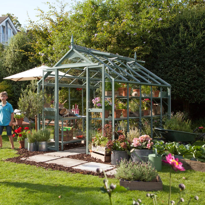 Rhino Ultimate 7x10 surrounded by plants in a beautiful garden