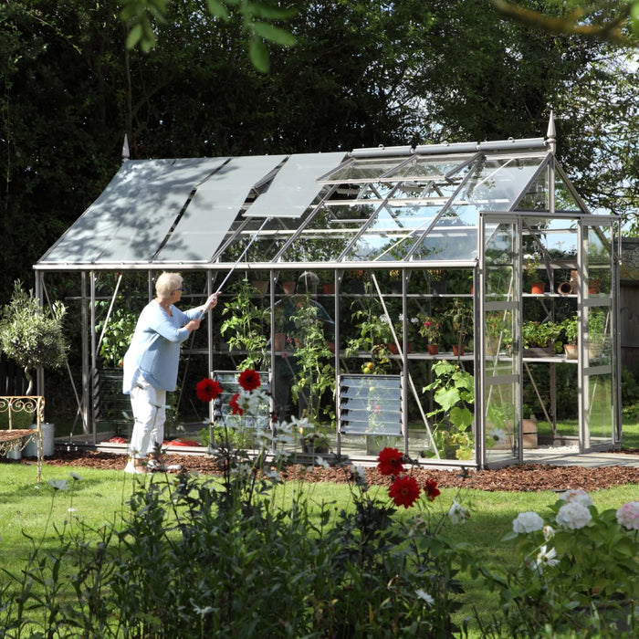 Woman lowering her Rhino's roof blinds on a summers day